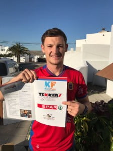 British midfielder Brad with the annual programme.