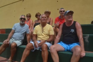 Catching a sun tan and watching a game of footy. Could be worse days.