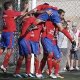 UD Lanzarote players celebrating a goal together