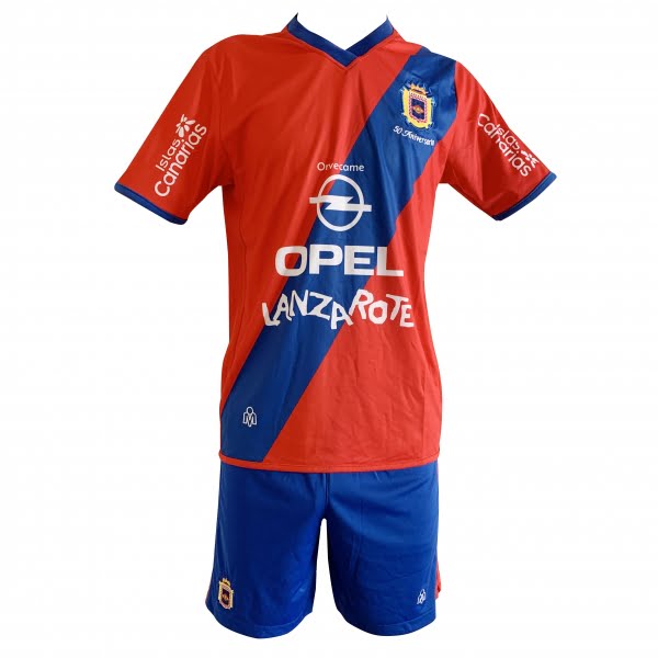 Lanzarote Football red shirt blue shorts